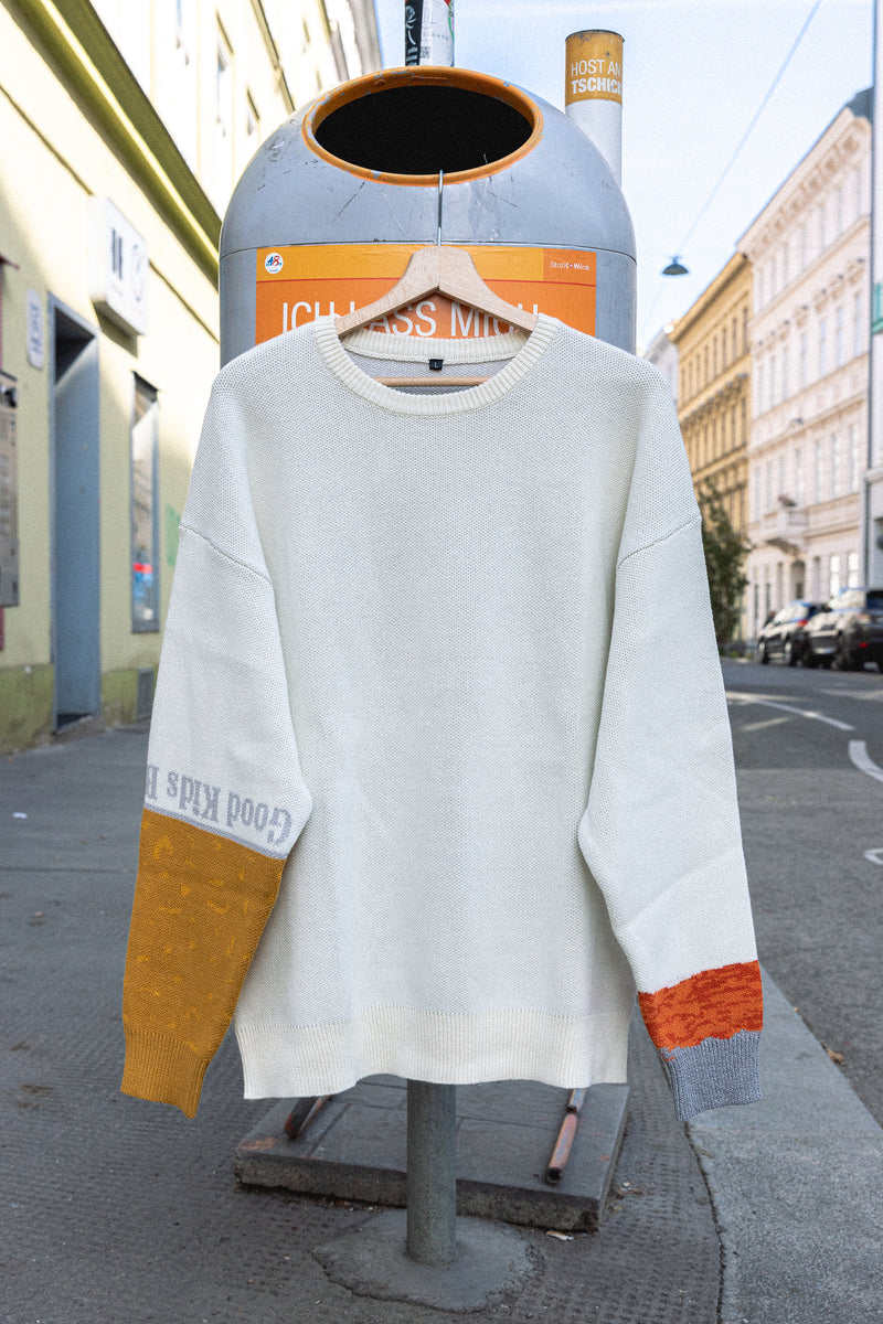 OVERSIZED CIGARETTE KNIT SWEATER